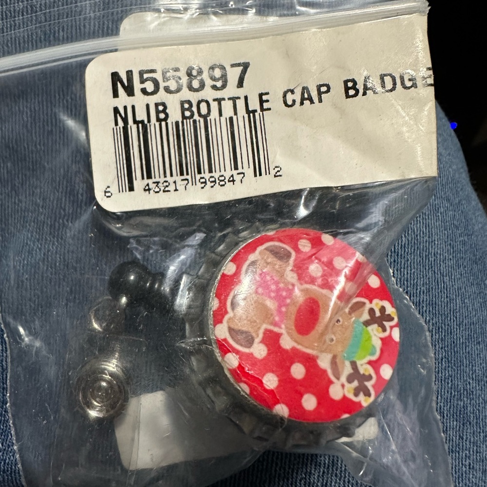NLIB bottle cap badge holder reel